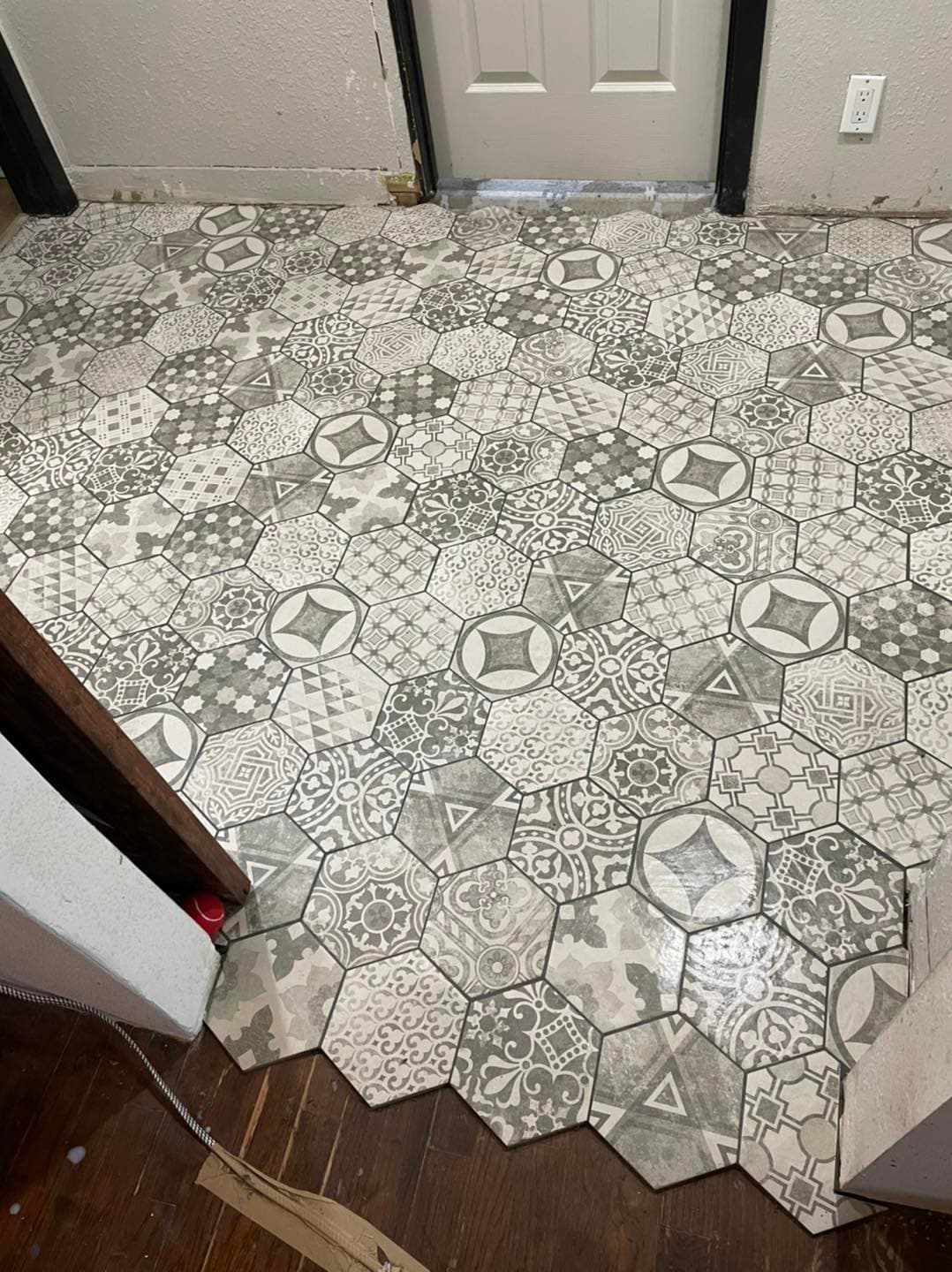 Hexagonal Bathroom Tile Overhaul – Custom Transition & Subfloor Repair